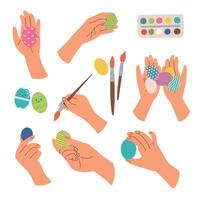 colorazione uova per Pasqua tempo a casa, mani hold uova e spazzole dipingere uova vettore