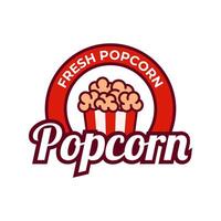 Popcorn logo, etichetta, simbolo o cartello isolato su bianca sfondo. vettore illustrazione di merenda per il tuo design.