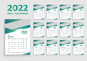 design del calendario da parete 2022. design del calendario da parete 2022. design del calendario del nuovo anno 2022. la settimana inizia il lunedì. modello per il calendario annuale 2022 vettore