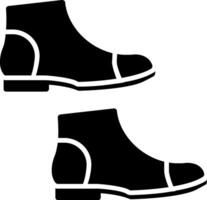 icona del glifo con stivali vettore