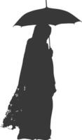 silhouette indipendente Emirates donne indossare abaya con ombrello nero colore solo vettore