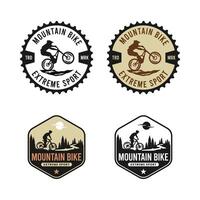 il emblema logo in mostra un' montagna bicicletta, incorporare un' corone, pini albero e mtb motociclista vettore