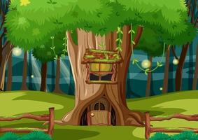 scena di foresta fantasy con casa sull'albero cavo vettore