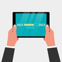 caricamento del nuovo anno dal 2021 al 2022 sullo schermo del tablet e sulla barra di avanzamento. vettore