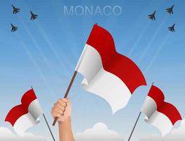 le bandiere di monaco sventolano sotto il cielo azzurro vettore