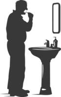 silhouette anziano uomo spazzolatura il suo denti nel davanti di specchio nero colore solo vettore