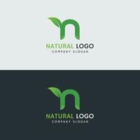 logo naturale n minuscola con foglia vettore