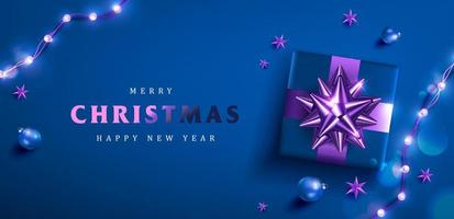 banner di promozione di buon natale e felice anno nuovo con decorazioni festive in sfondo blu vettore