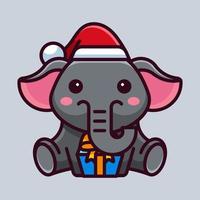 simpatico elefante festeggia il natale vettore