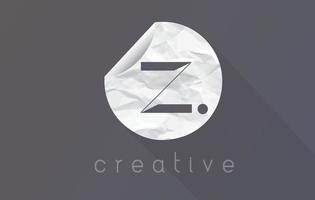 logo della lettera z con trama di carta da imballaggio stropicciata e strappata. vettore