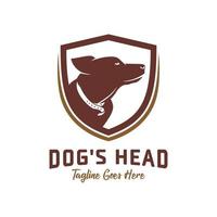 modello di progettazione del logo dello scudo della testa di cane vettore