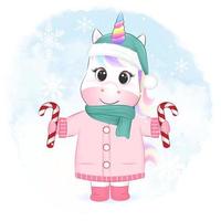 simpatico unicorno che tiene in mano un bastoncino di zucchero. illustrazione della stagione natalizia vettore