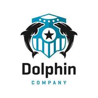 modello di progettazione del logo dello scudo del delfino vettore