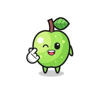 personaggio della mela verde che fa il cuore coreano del dito vettore