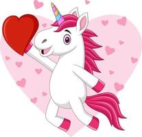simpatico cartone animato bambino unicorno che tiene il cuore vettore