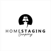 logo della proprietà home staging concetto astratto lampada vettore