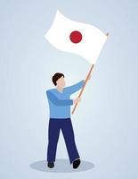 uomo che sventola il fumetto della bandiera giapponese vettore