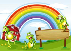 Una tavola di legno vuota con le rane e un arcobaleno nel cielo vettore