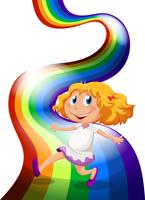 Una ragazza che gioca all&#39;arcobaleno vettore