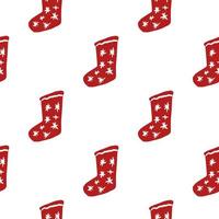 modello doodle senza cuciture isolato con calze natalizie di colore rosso. sfondo bianco. sfondo di vacanze invernali. vettore