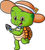 la simpatica tartaruga indossa il cappello da spiaggia e tiene in mano la pala vettore