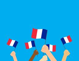 Illustrazione vettoriale mani che tengono le bandiere della Francia su sfondo blu
