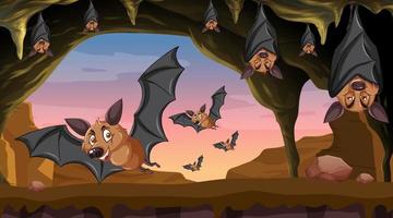 scena della grotta con gruppo di pipistrelli in stile cartone animato vettore