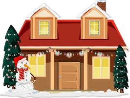 casa innevata con un pupazzo di neve e alberi di Natale decorati vettore