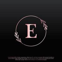 elegante logo floreale cerchio lettera e con linea di diramazione monogramma foglia elegante creativa e colore nero rosa. utilizzabile per loghi aziendali, moda, cosmetici, spa, scienza, medicina e natura. vettore