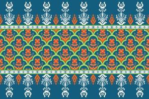 fiore d'arancio su blu indaco, verde geometrico etnico orientale modello design tradizionale per sfondo, moquette, carta da parati, abbigliamento, avvolgimento, batik, tessuto, illustrazione vettoriale stile ricamo