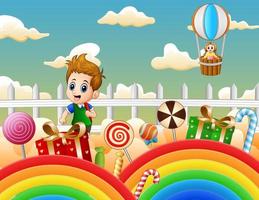 terra di fantasia con illustrazione di bambini e caramelle vettore
