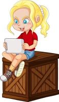 una ragazza felice seduta su una cassa e giocare a tablet vettore