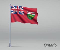 sventolando la bandiera dell'ontario - provincia del canada sul pennone. modello vettore