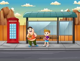 simpatici due ragazzi che tengono cibo alla fermata dell'autobus