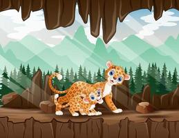 cartone animato una madre leopardo con il suo cucciolo nella grotta