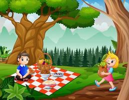 illustrazione di bambini che fanno un picnic nel parco vettore