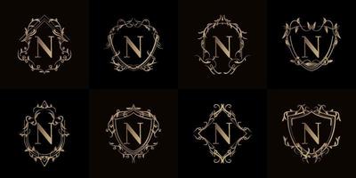 collezione di logo iniziale n con ornamento di lusso o cornice floreale vettore