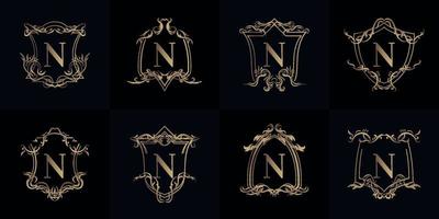 collezione di logo iniziale n con ornamento di lusso o cornice floreale vettore