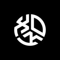 xok lettera logo design su sfondo nero. xok creative iniziali lettera logo concept. disegno della lettera xok. vettore