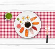 sushi, cibo giapponese sul fondo della tavola di legno