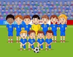 squadra di bambini di calcio dei cartoni animati in uno stadio vettore