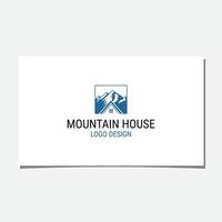 vettore di design del logo di montagna e casa
