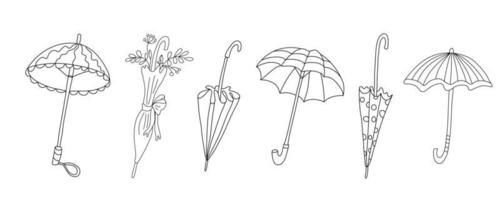 set vettoriale con ombrelli aperti e chiusi in stile doodle.