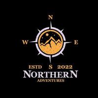 logo di una comunità di alpinisti del nord a forma di compasso in cui è presente l'immagine di una montagna vettore