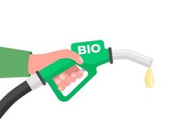 mano che tiene un ugello del carburante con la scritta bio. vettore del concetto di biocarburante.
