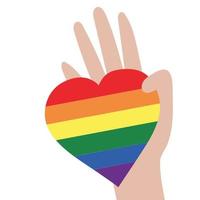 illustrazione vettoriale della comunità lgbt. mano che tiene un cuore arcobaleno. simbolismo e colori lgbtq