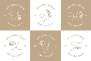lettere disegnate a mano minimaliste ed eleganti dalla u alla z logo botanico floreale vettore