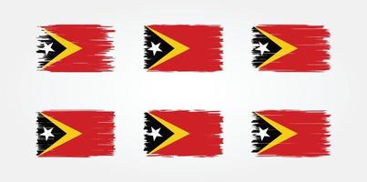 collezione di pennelli bandiera timor est. bandiera nazionale vettore