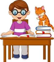 ragazzino del fumetto che studia accompagnato da un gatto vettore