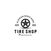 modello classico vintage di design del logo del negozio di pneumatici vettore